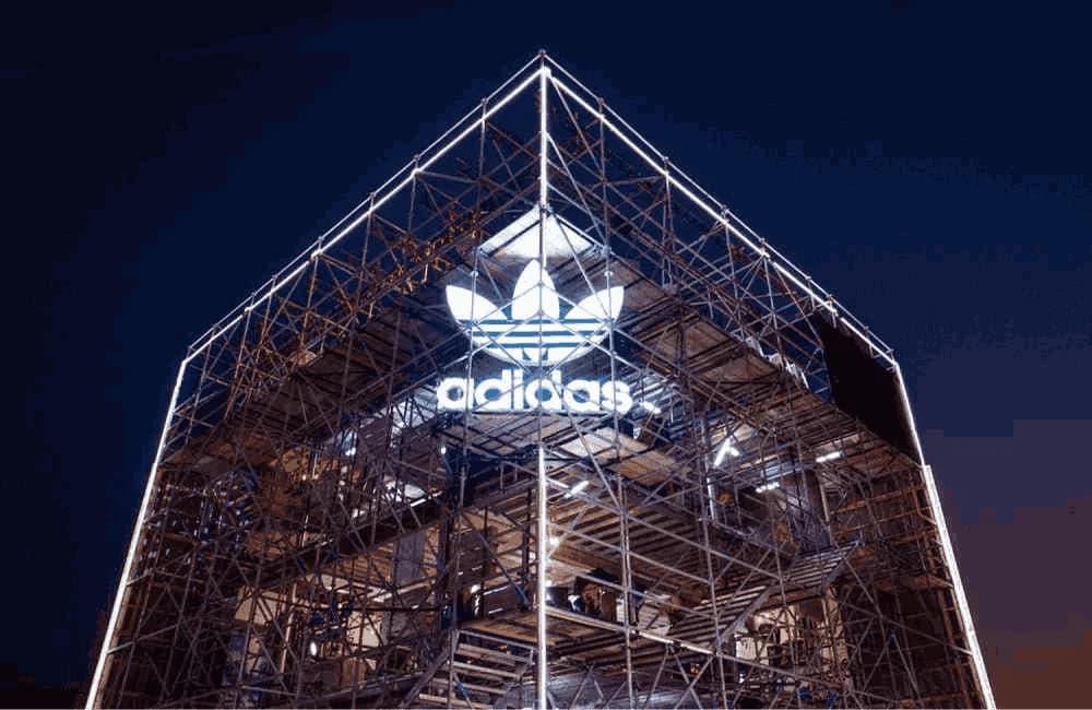 The Adidas structure Sweetwater built for Sole DXB, lit at night.